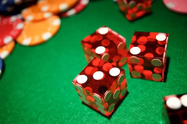 Live dealer studio with multiple camera angles displaying Boom City table action